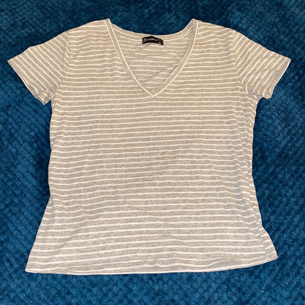 grey an white striped shirt